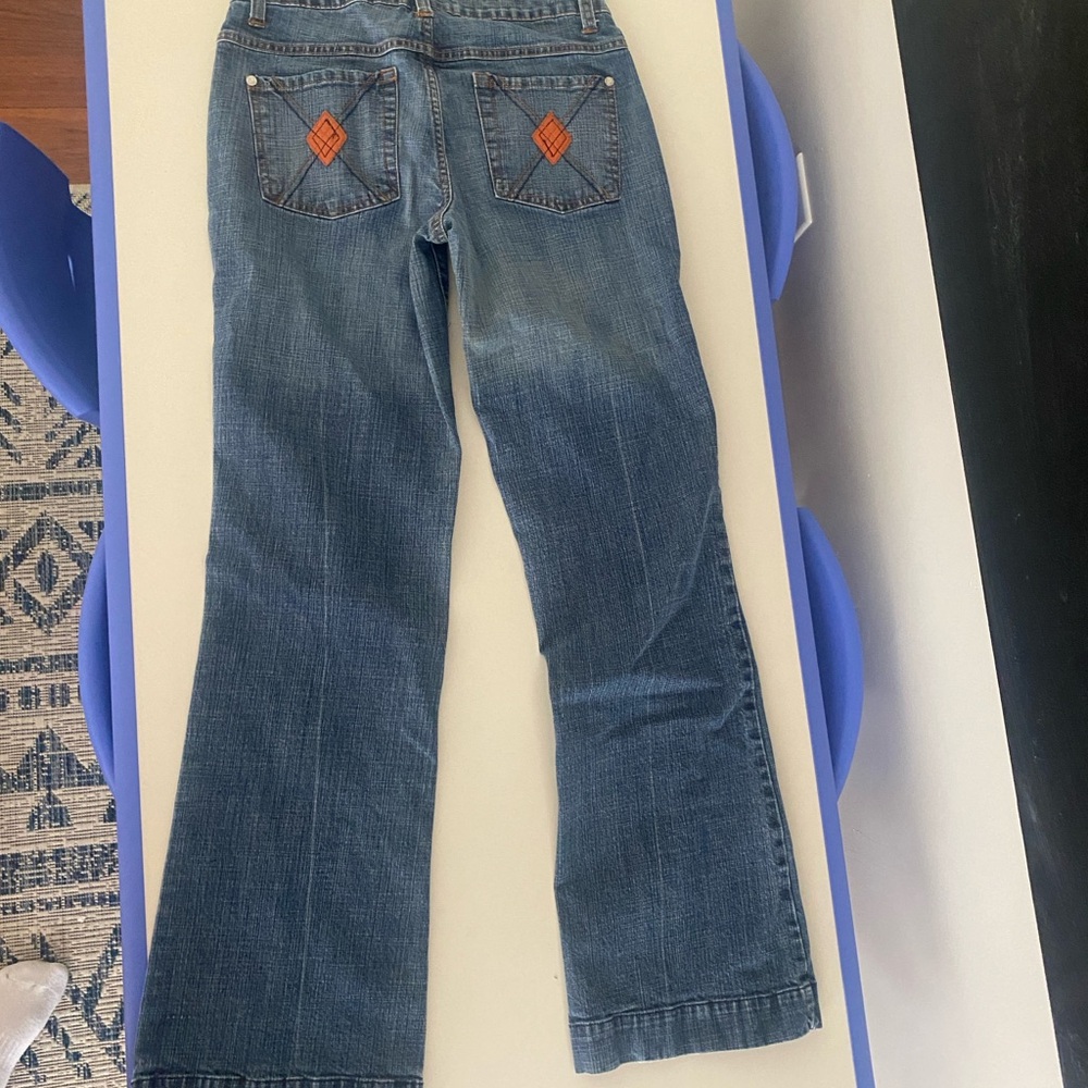 Vintage Dark Blue Flared Jeans with Orange Pocket Accent